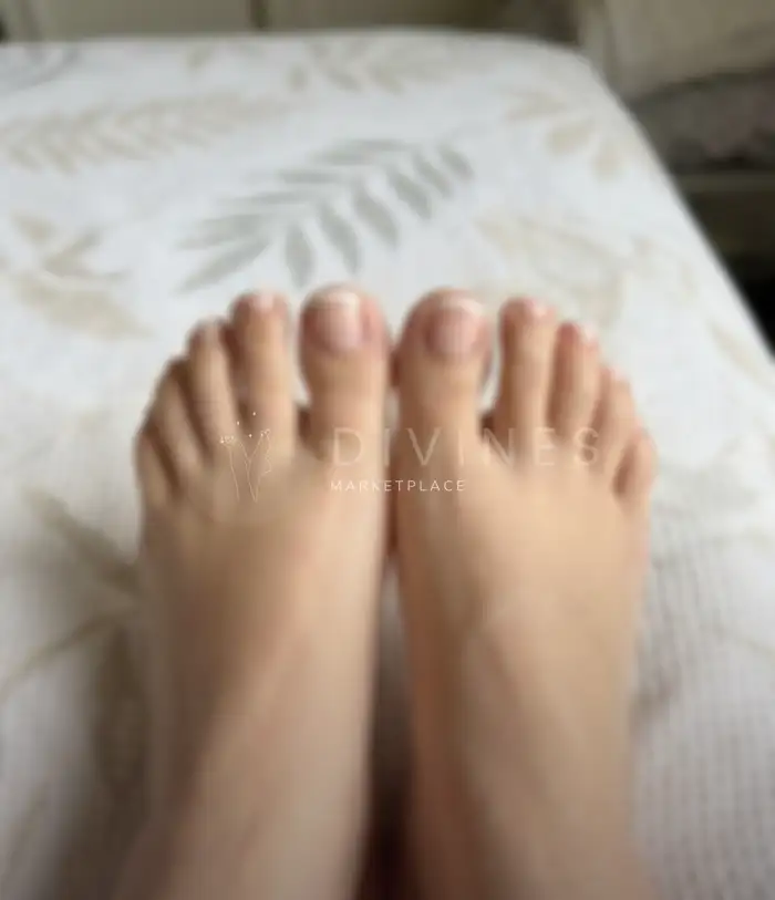 A clean and classic French pedicure that highlights the natural shape of the nails